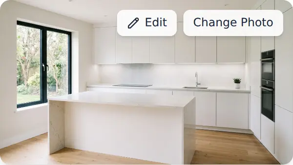 A kitchen with plain grey counters